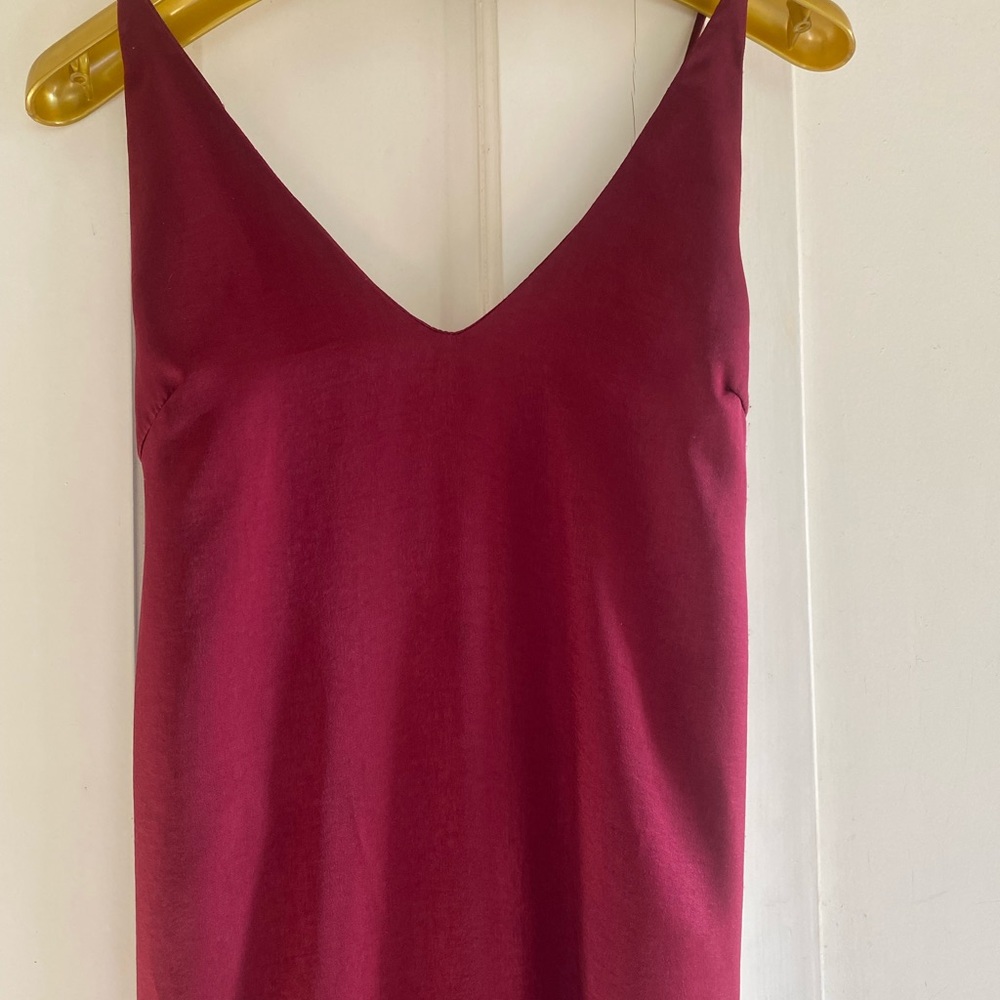 Burgundy Long satin stappy dress with front slit.